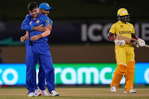 Fazalhaq Farooqi celebrates Ronak Patel's wicket